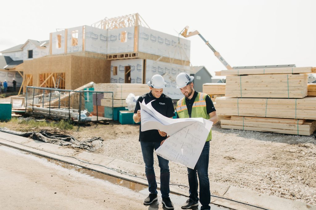 JP owner of JP Brooks Builders onsite with construction plans